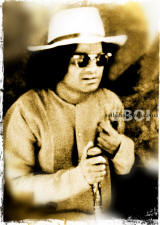 sathya-sai-baba-wearing-sun-glasses-and-hat