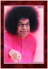 sathya-sai-baba-good-mood-photo-pointing-at-something