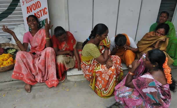 Devotees of Satya Sai Baba burst into tears after his death was announced in the village of Puttaparthi,